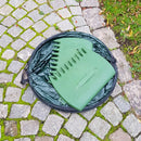 Zacky trädgårdssäck ihopvikt på marken